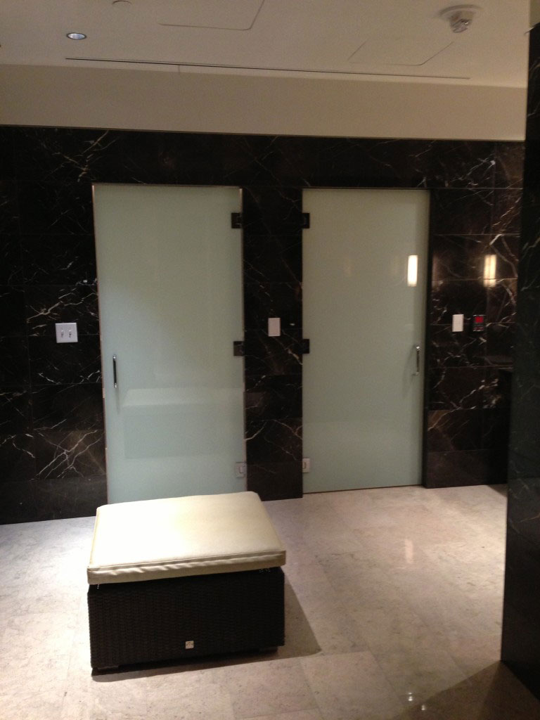 Architectural glass doors in building