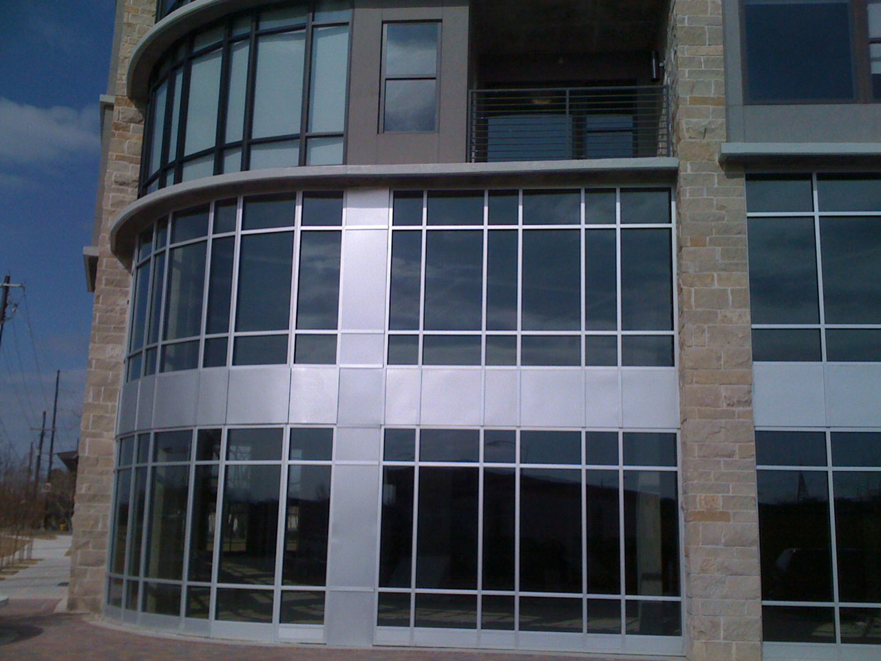 Building with architectural glass exterior windows