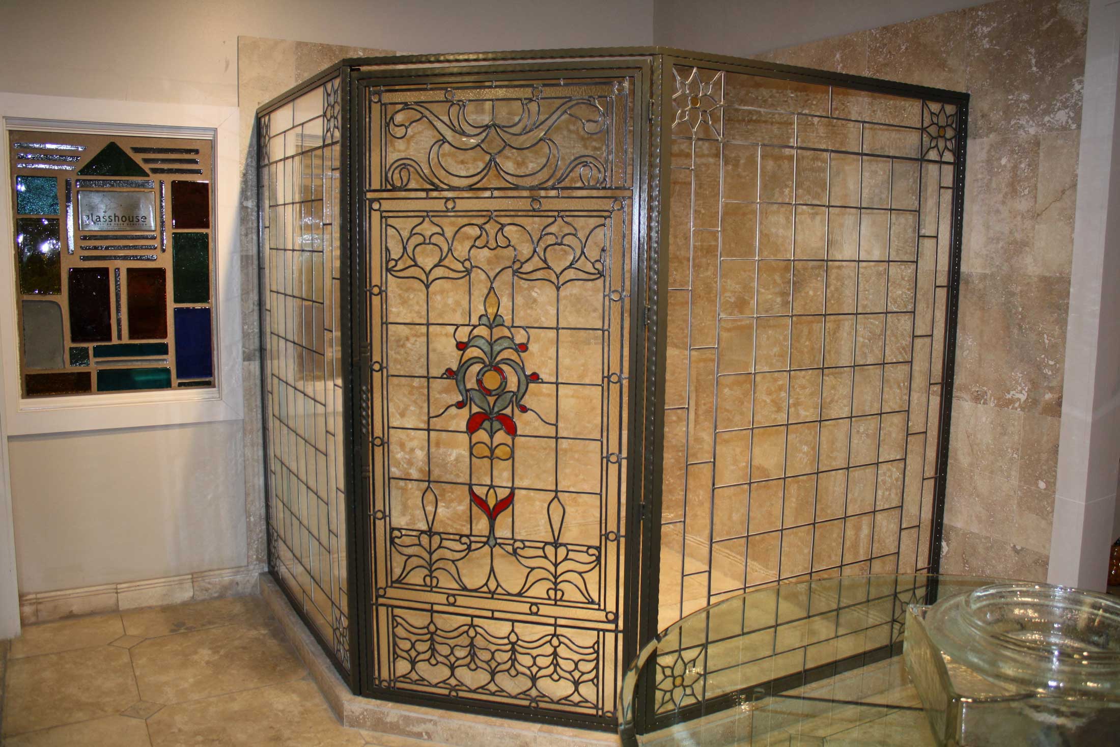Beautiful glass shower doors with stained glass features
