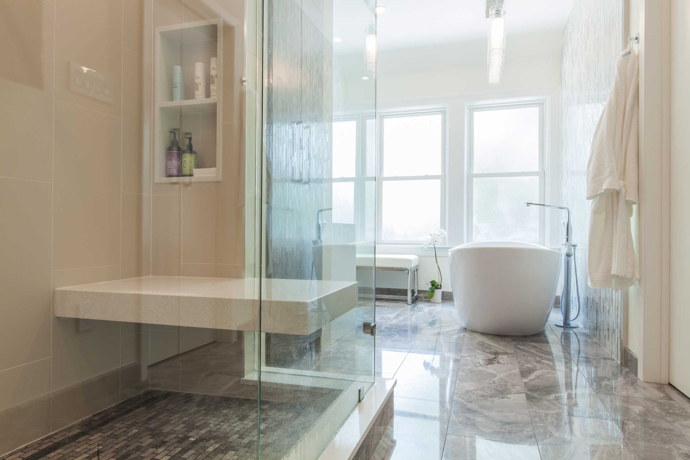 Bathroom with frameless glass shower doors