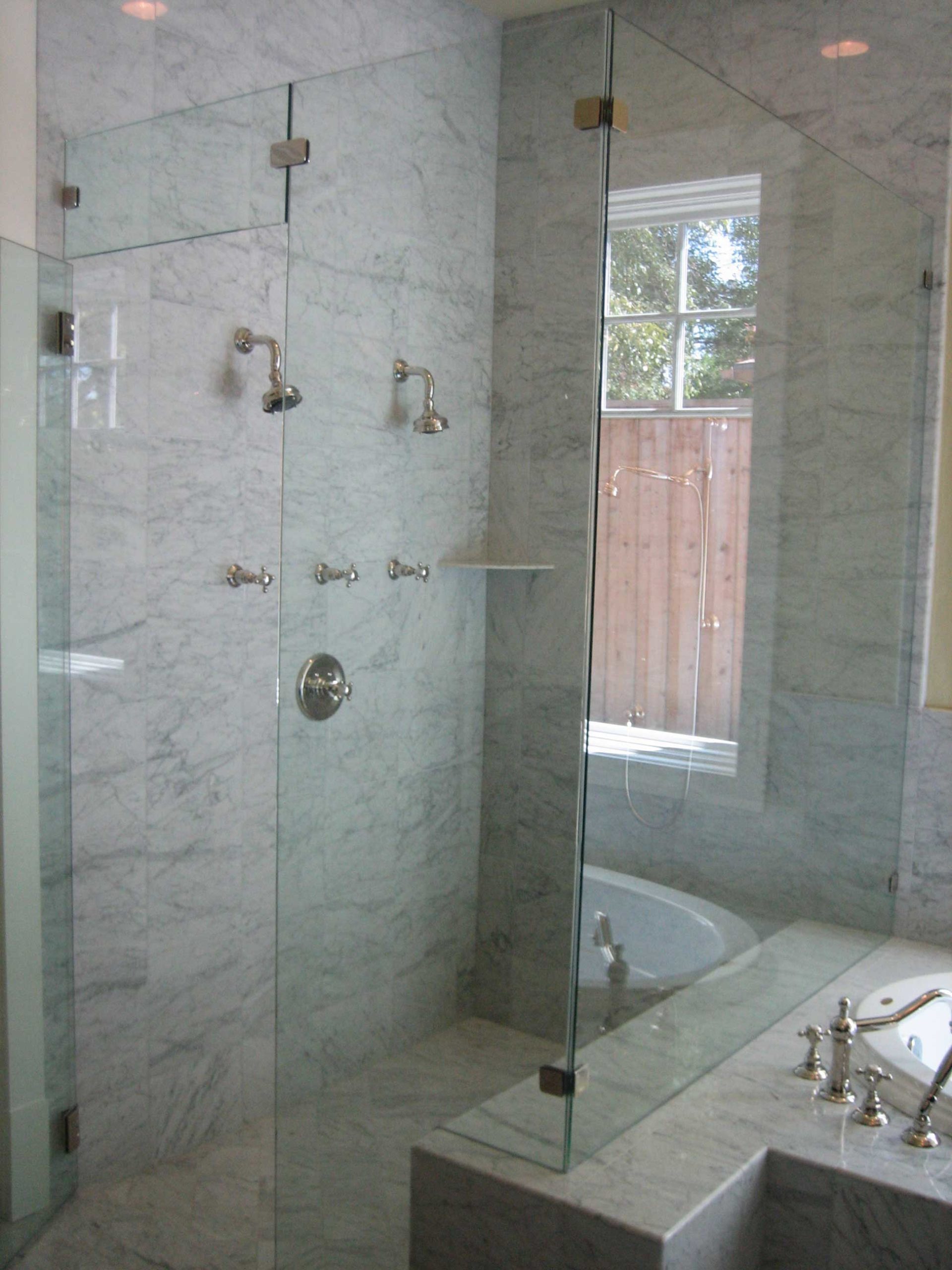 Frameless glass shower doors in luxury bathroom